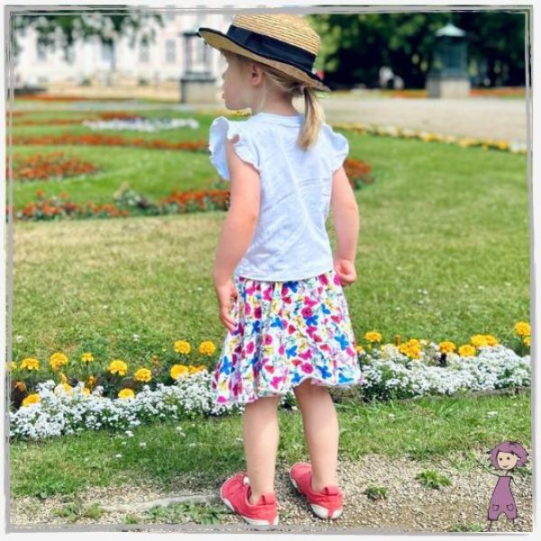 Teller-Rock Blumen und Schmetterlinge